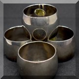 K30. Set of 4 silvertone napkin rings - $12 